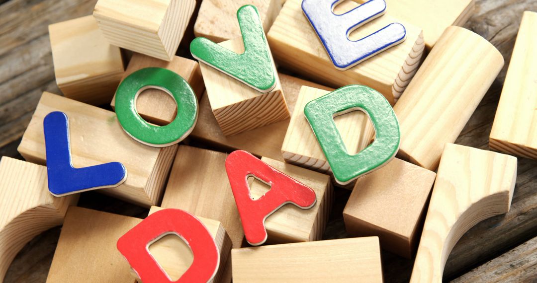 Colorful Wooden Blocks Spelling Love Dad - Free Images, Stock Photos and Pictures on Pikwizard.com