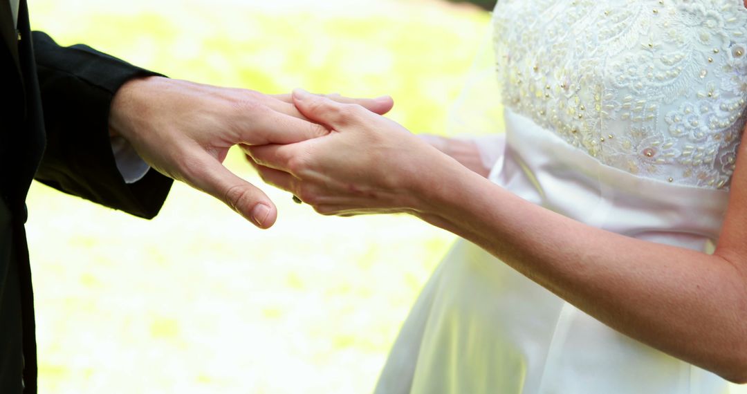 Close-up of Bride and Groom Holding Hands at Wedding Ceremony - Free Images, Stock Photos and Pictures on Pikwizard.com