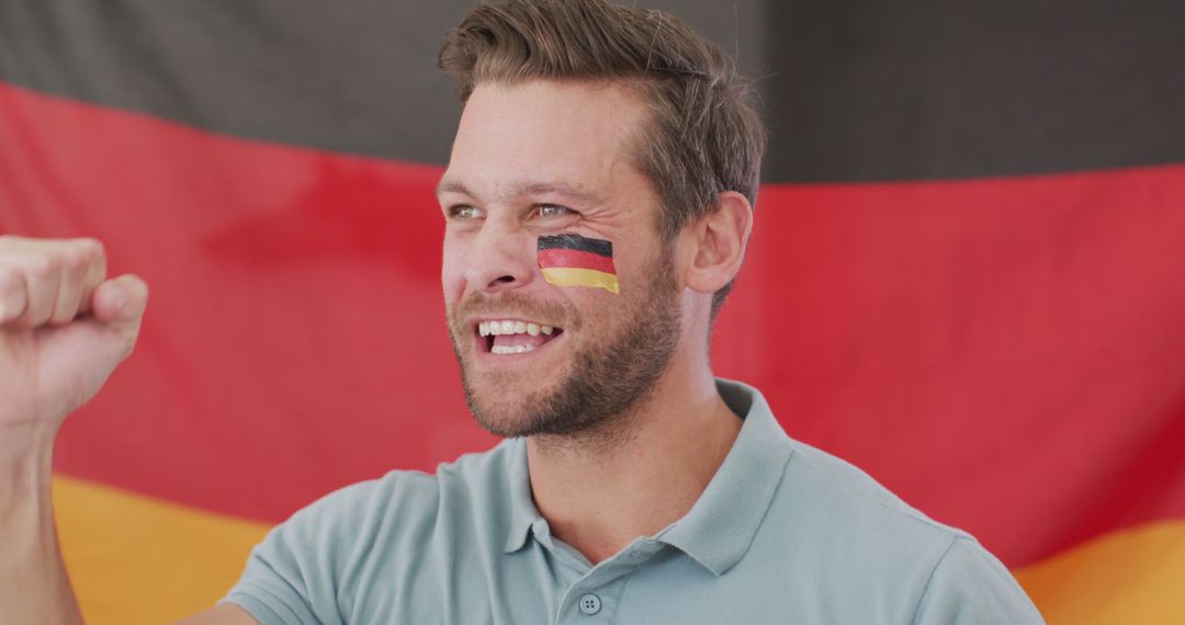 Image of excited caucasian man with flag of germany watching match in tv - Free Images, Stock Photos and Pictures on Pikwizard.com