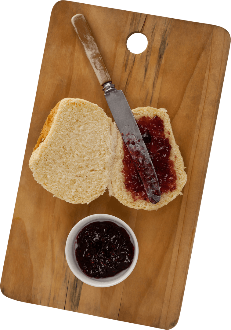 Transparent Cutting Board with Bread, Jam, and Knife
