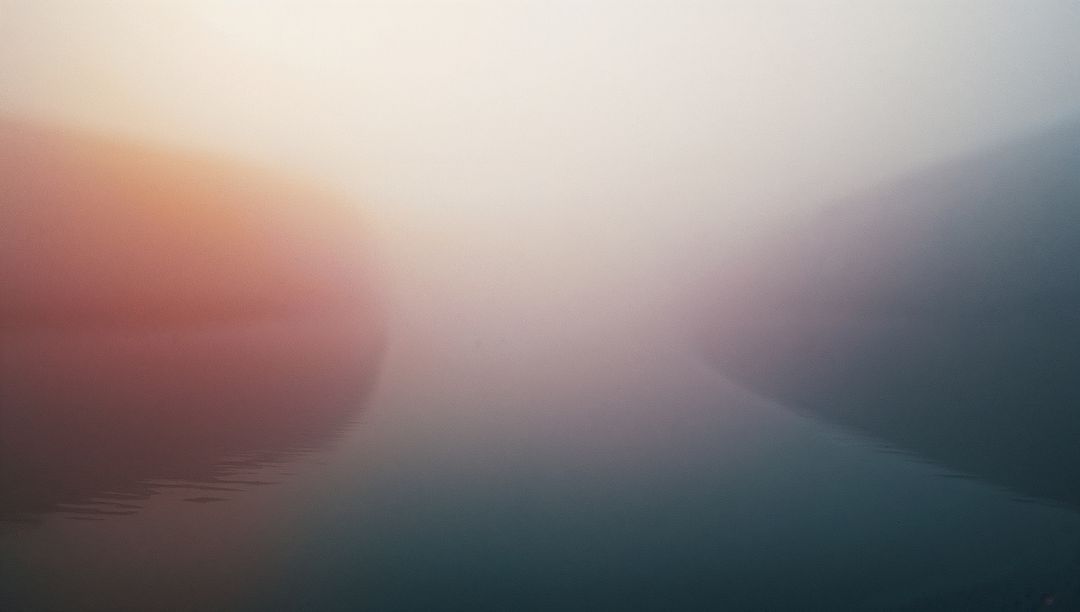 Misty Water Channel at Dawn with Tranquil Fog and Soft Colors