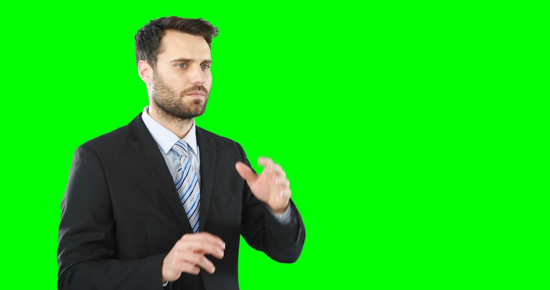 Businessman Gesturing with Hands on Green Screen - Free Images, Stock Photos and Pictures on Pikwizard.com