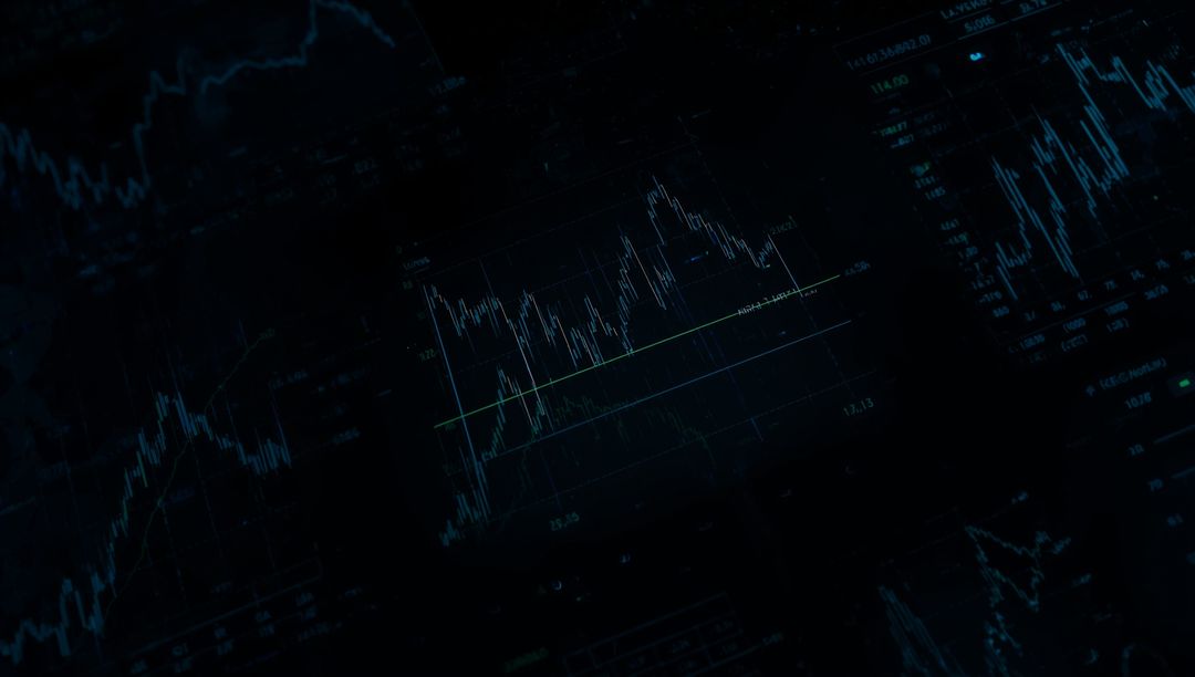 Dimly Lit Trading Charts on Monitor for Technical Analysis