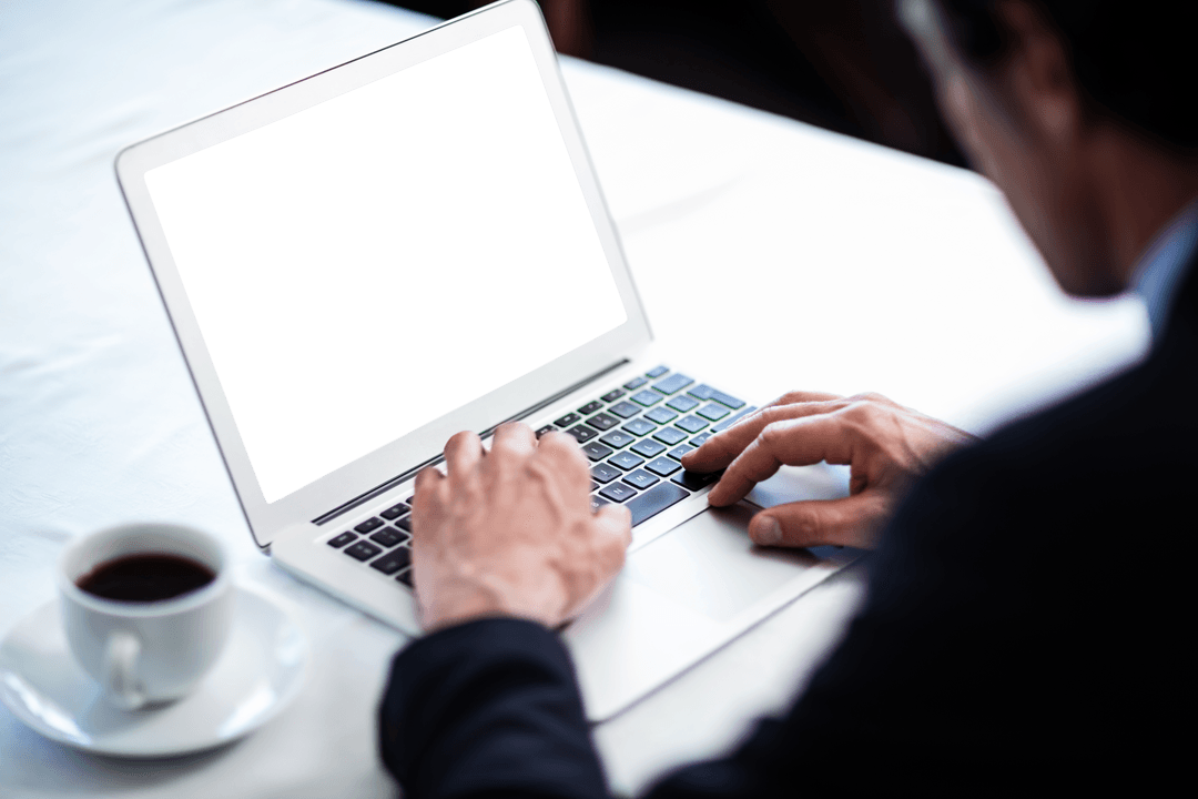 Businessman Working on Transparent Laptop Screen in Cafe with Coffee