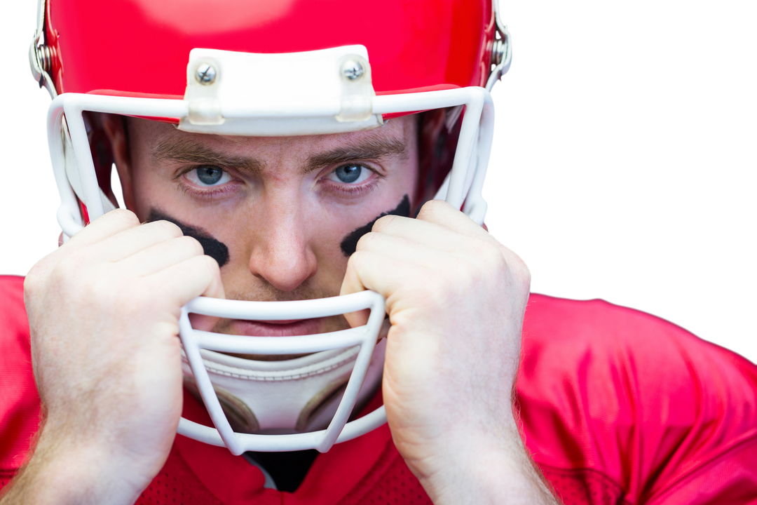 Close-up of Football Player Holding Helmet Against Clear Background - Download Free Stock Images Pikwizard.com