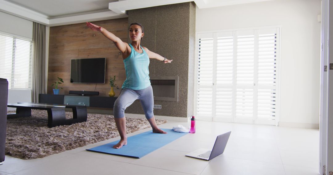 Home Yoga Practice with Laptop Guidance - Free Images, Stock Photos and Pictures on Pikwizard.com