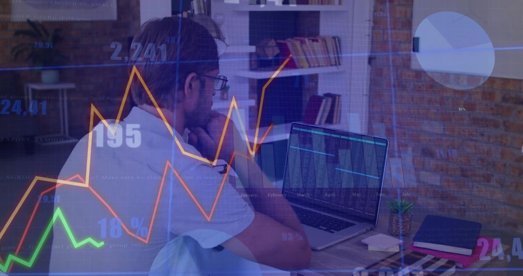 Programmer Analyzing Data with Graphs Overlayed in Modern Office