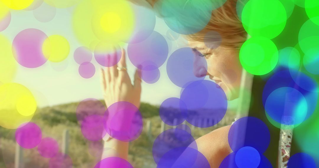 Contemplative Woman Enjoying Sunlight with Colorful Bokeh Overlays