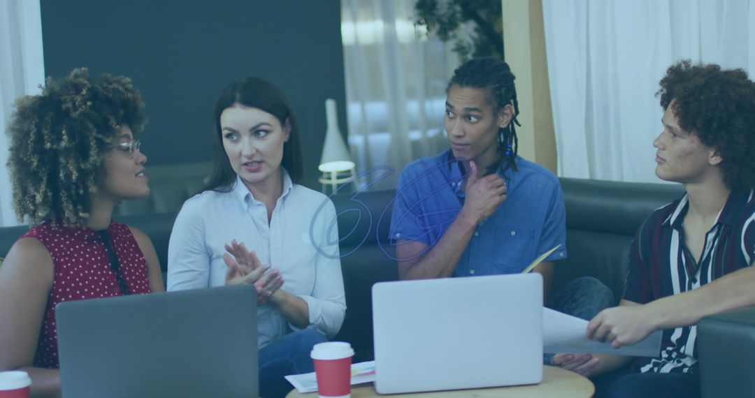 Diverse Team Collaborating Over Project Plan