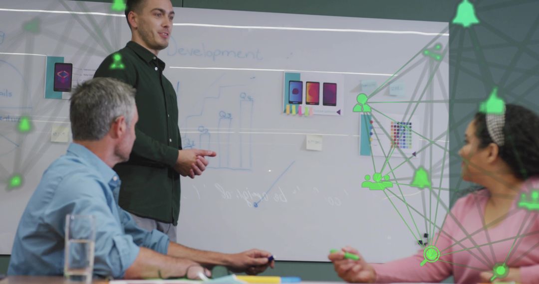 Business Team Collaborating on Software Strategy in Conference Room