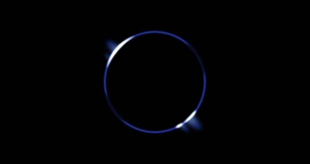Glowing Blue Circle on Black Background Illustrating Movement