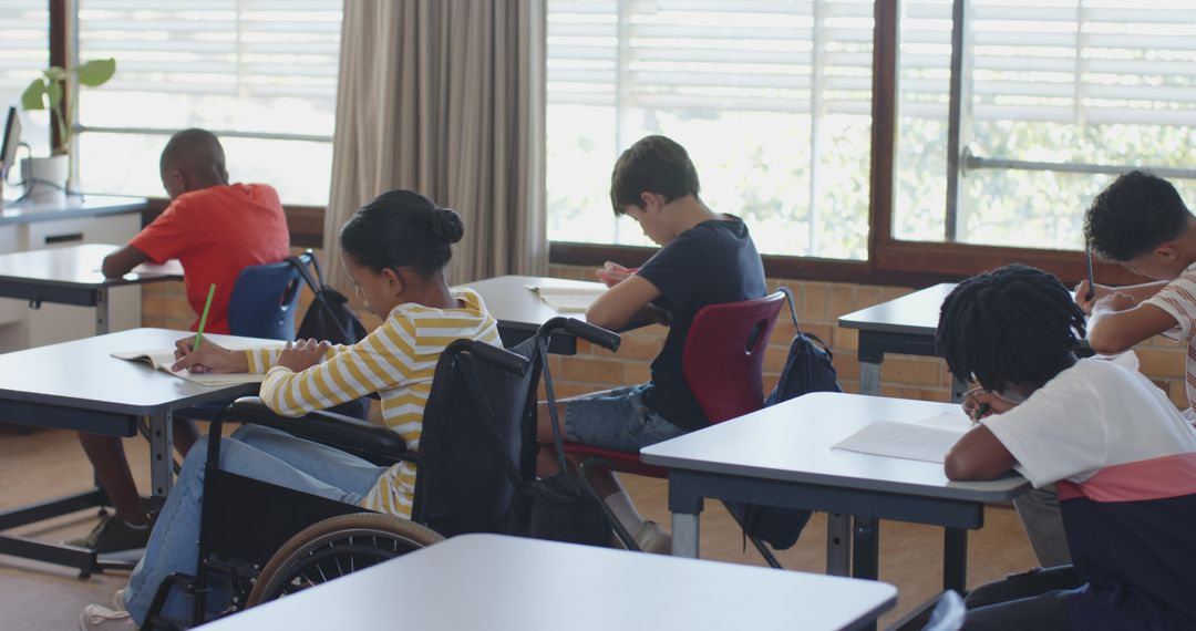 Diverse Classroom Setting with Wheelchair User Writing
