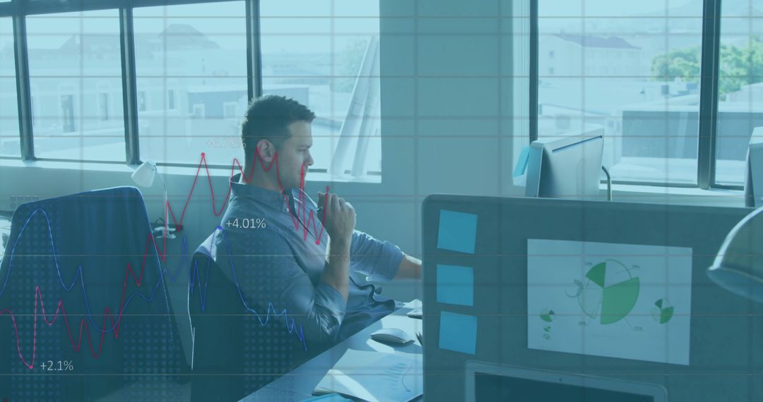 Business Analyst Analyzing Financial Data in Modern Office Environment