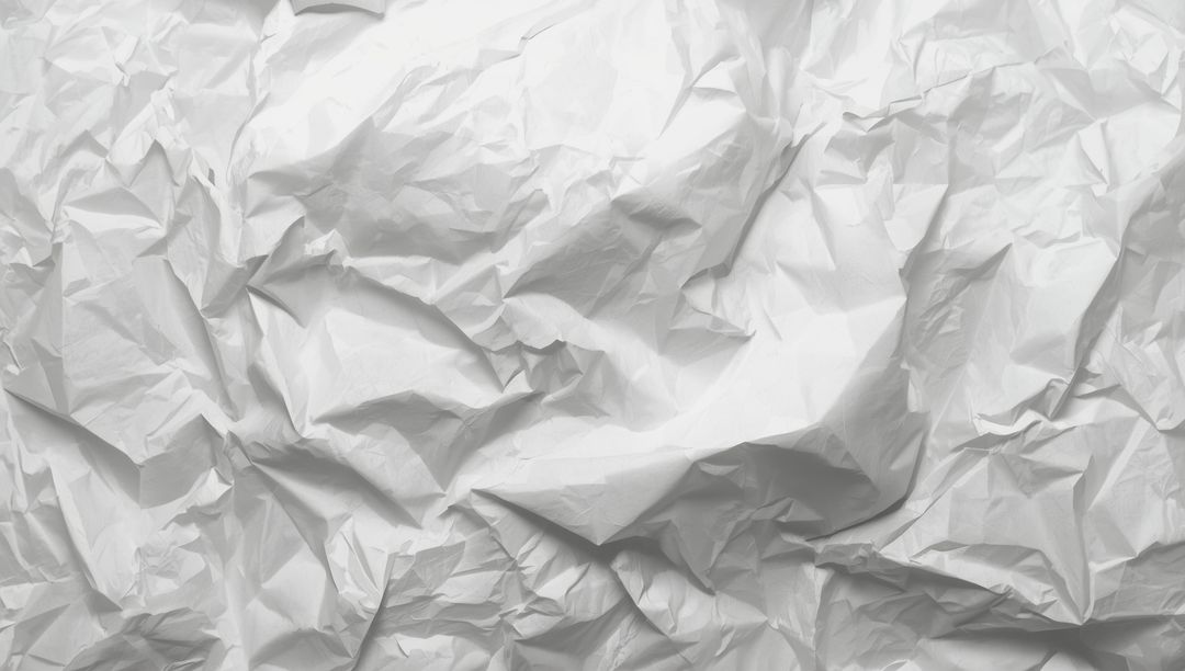 Crumpled White Paper Sheet Texture with Irregular Folds
