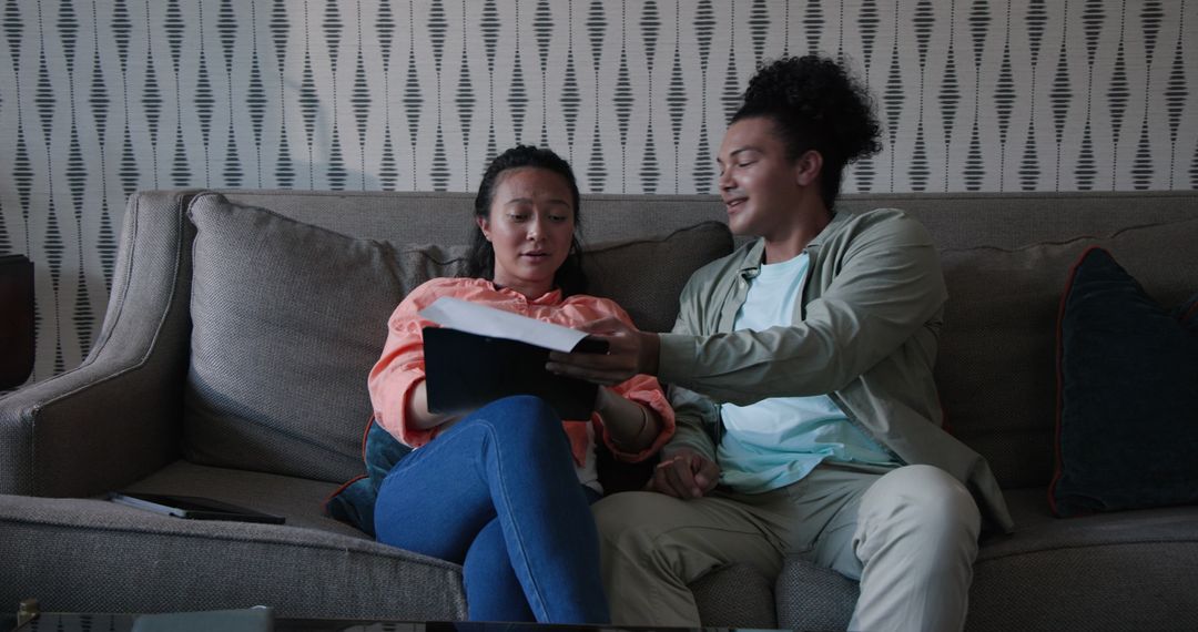 Couple Relaxing on Sofa Enjoying Quality Time