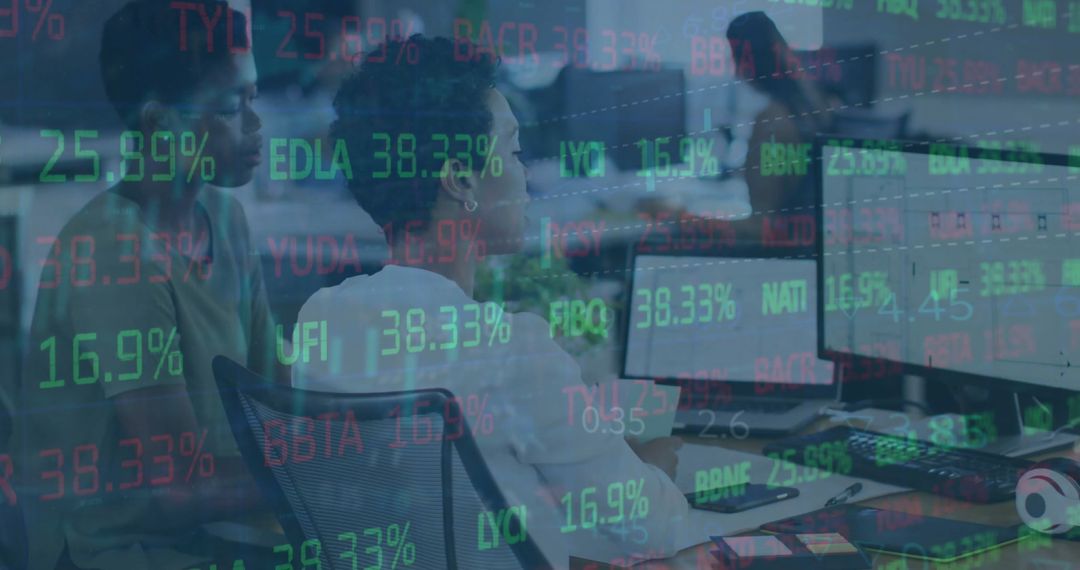 Diverse Professionals Analyzing Financial Data with Digital Overlay in Office