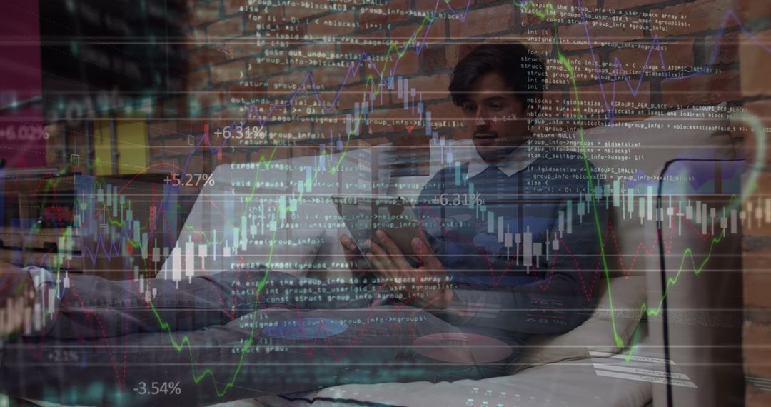 Businessman Analyzing Data on Tablet with Digital Graph Overlay