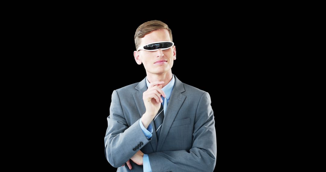 Man Pondering with Futuristic Smart Glasses on Isolated Black Background - Free Images, Stock Photos and Pictures on Pikwizard.com