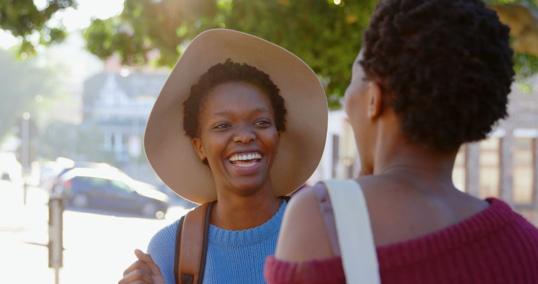 Joyful Twin Sisters Enjoying Day Out in City