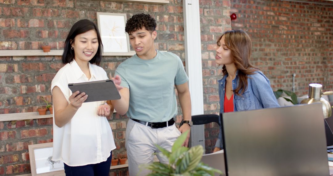 Diverse Team Collaborating Ideas in Modern Loft Workspace