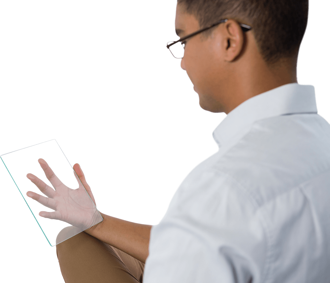 Man Operating Futuristic Transparent Glass Tablet Device