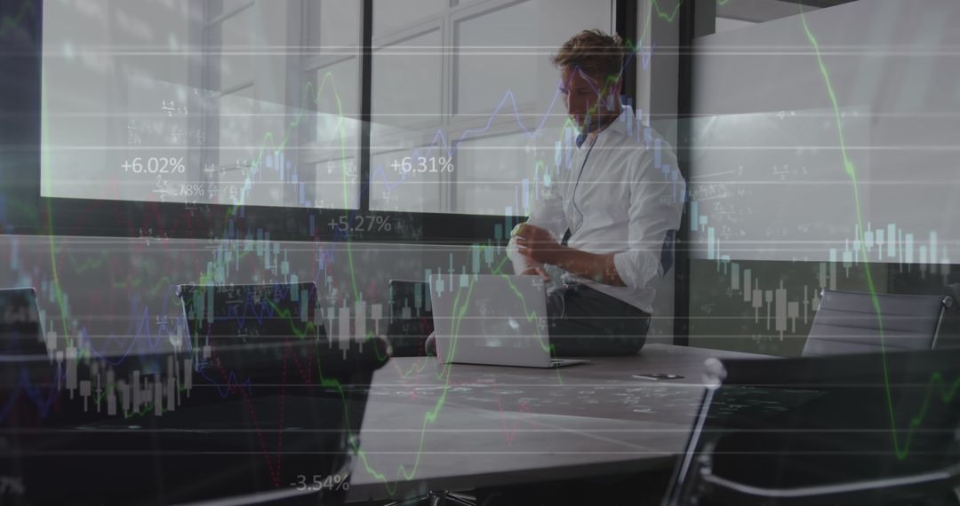 Executive Monitoring Stock Market Trends with Digital Interface