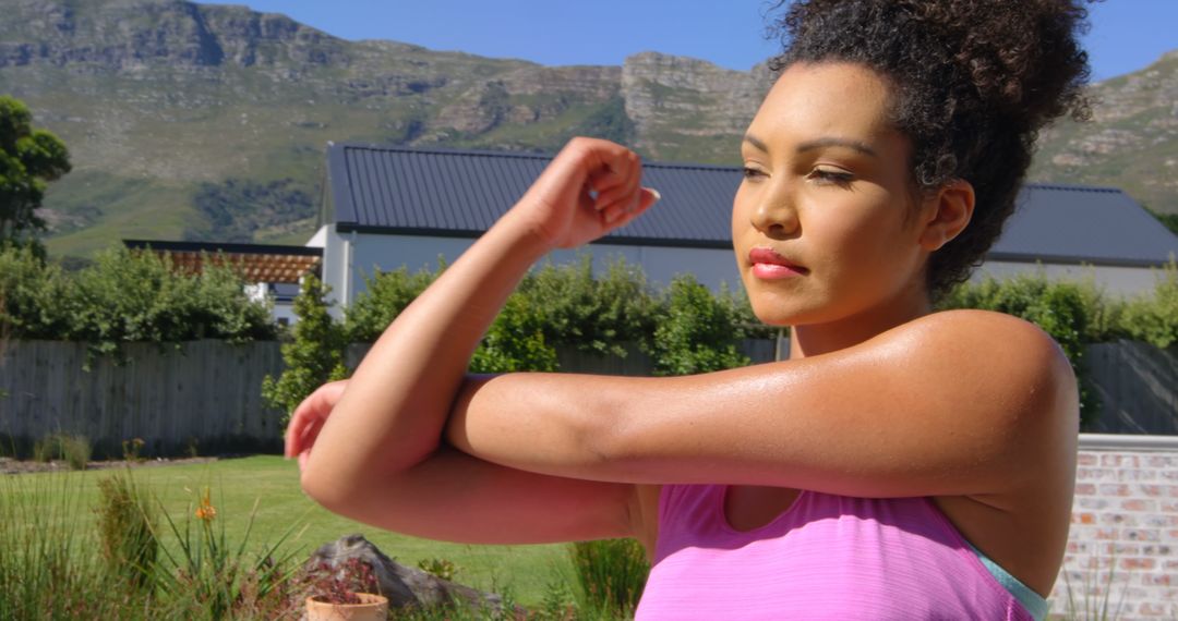 Woman Stretching Arm Outdoors During Workout - Free Images, Stock Photos and Pictures on Pikwizard.com