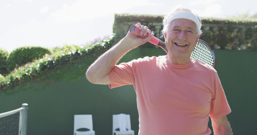 Senior Man Enjoying Tennis Game Outdoors - Free Images, Stock Photos and Pictures on Pikwizard.com