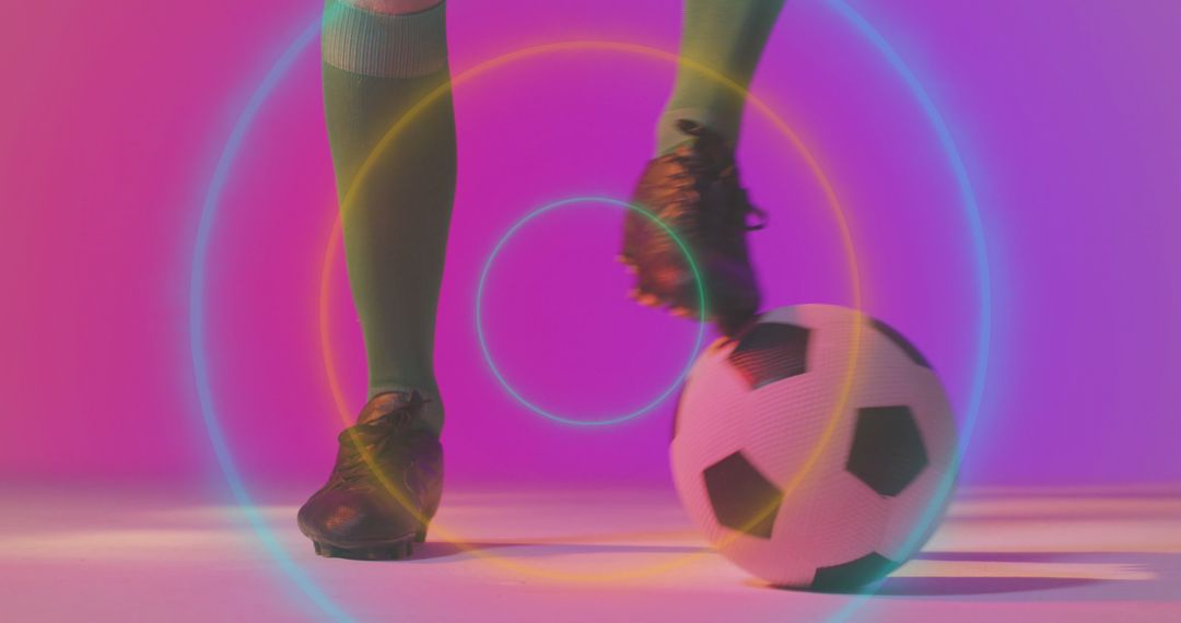 Soccer Player Foot on Ball with Neon Light Effects - Free Images, Stock Photos and Pictures on Pikwizard.com