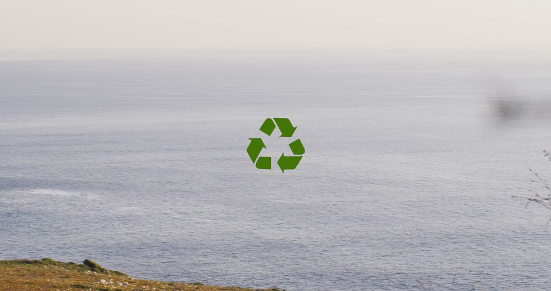 Recycling Symbol Overlooking Calm Ocean Scenery