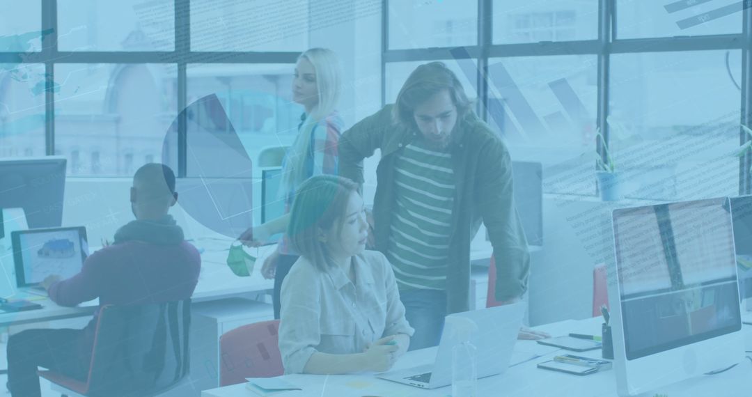 Team Discussing Digital Data in Modern Office Environment