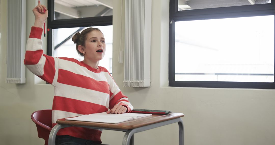 Engaged Student Enthusiastically Participating in Class