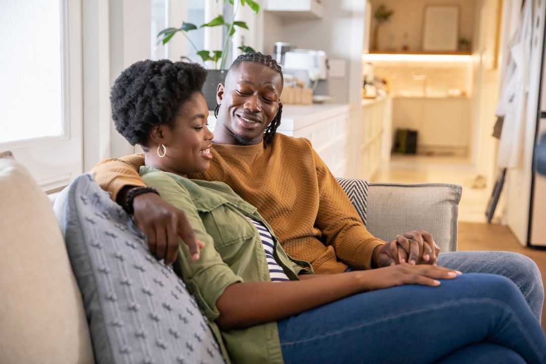 Relaxed African American Couple Enjoying Cozy Home Lifestyle