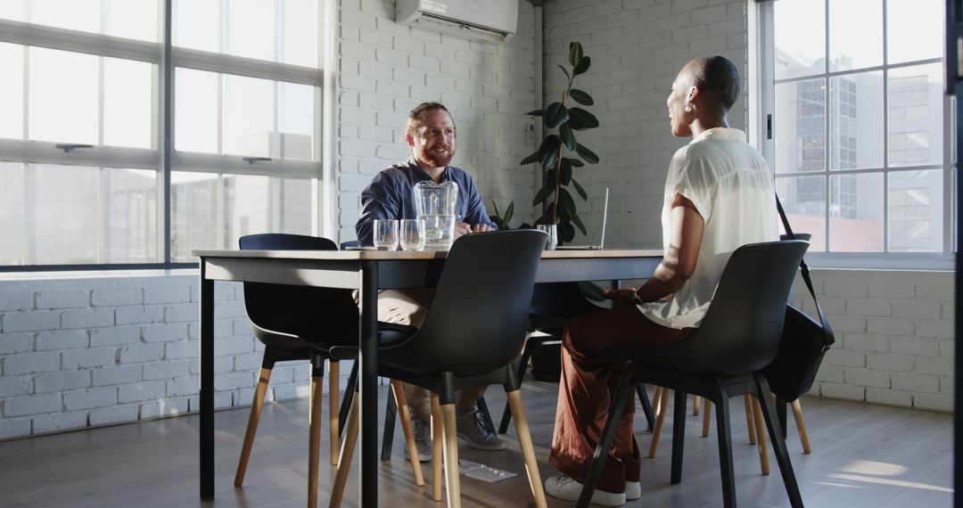 Professional Meeting in Modern Office Setting with Colleagues