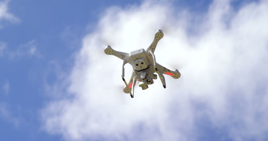 A drone flying in the sky during a sunny day - Free Images, Stock Photos and Pictures on Pikwizard.com