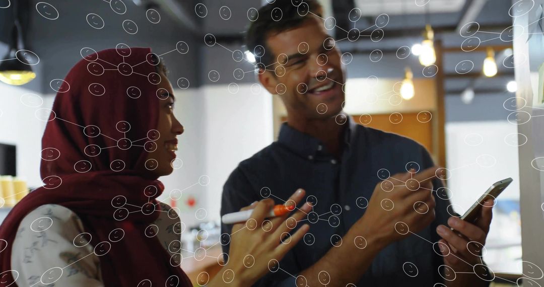 Modern Diverse Teams Collaborating with Technology in Office