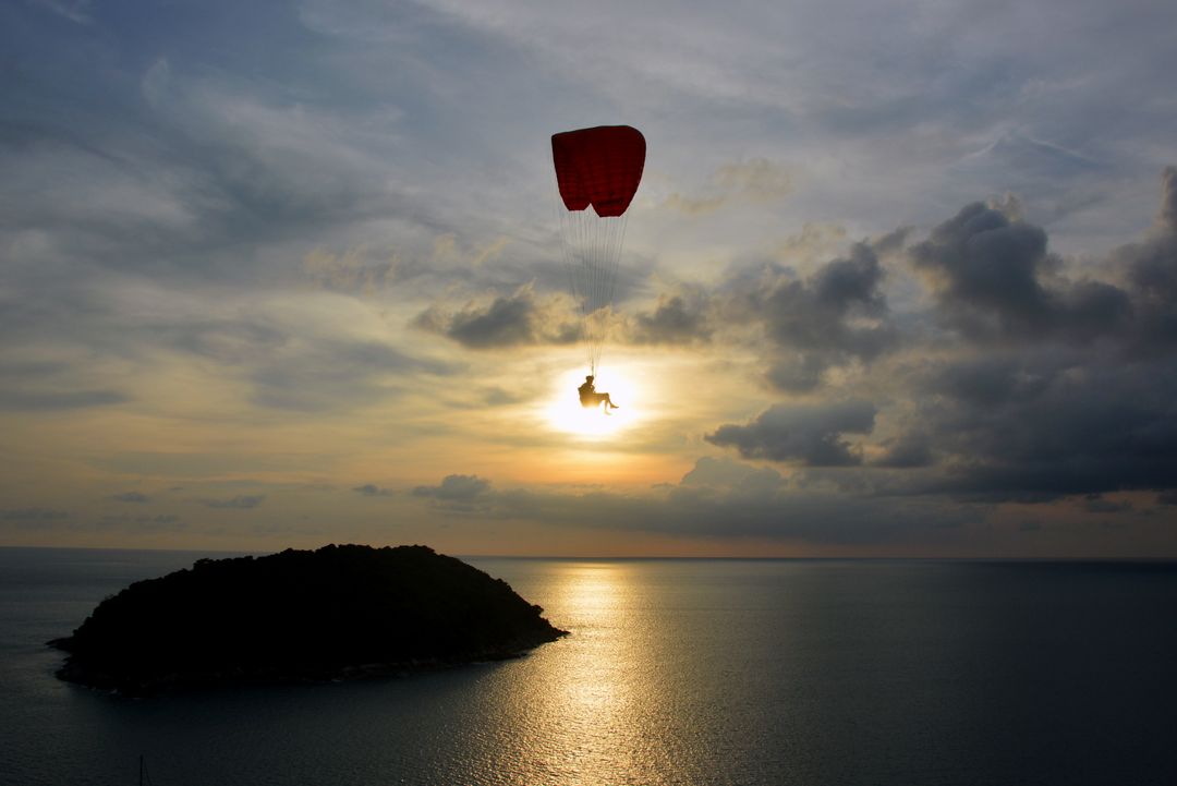 Paraglider over Calm Ocean at Sunset - Free Images, Stock Photos and Pictures on Pikwizard.com