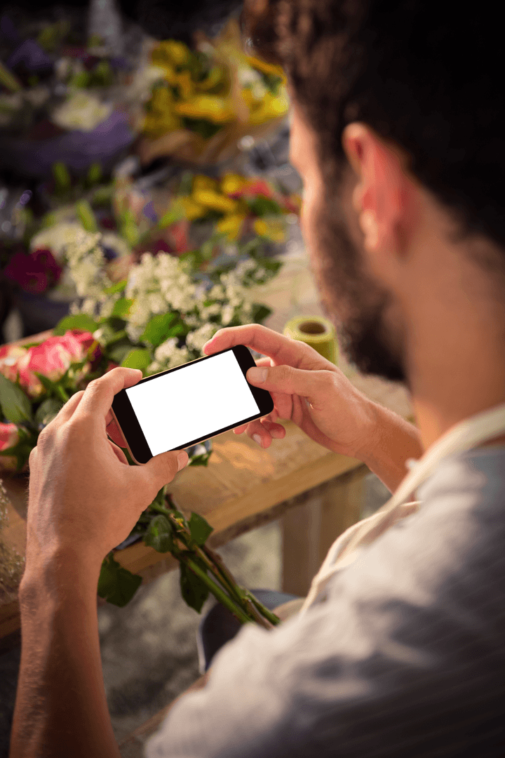 Man Taking Transparent Flower Photo in Florist Shop for Social Media