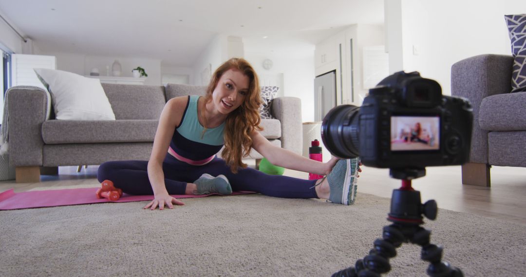 Woman Recording Yoga Session at Home - Free Images, Stock Photos and Pictures on Pikwizard.com