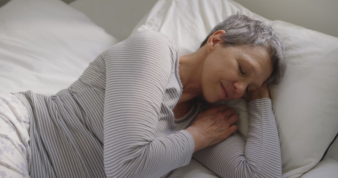 Peaceful Sleep: Elderly Woman Resting Comfortably in Cozy Bedroom - Free Images, Stock Photos and Pictures on Pikwizard.com