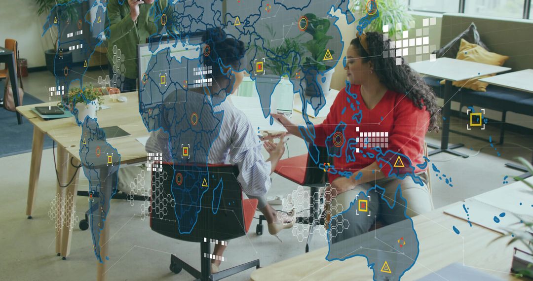 Collaborating in Modern Office with Digital World Map Overlay