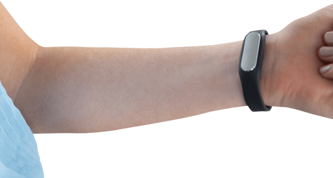 Woman's Arm Wearing Fitness Tracker on Transparent Background