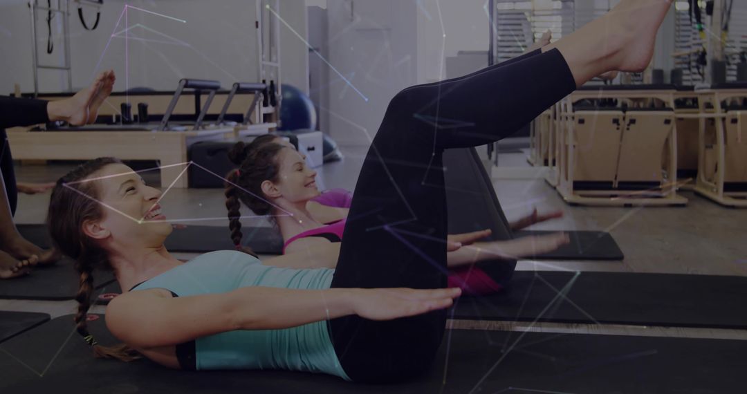 Group Pilates Session Focusing on Core Strength in Modern Yoga Studio