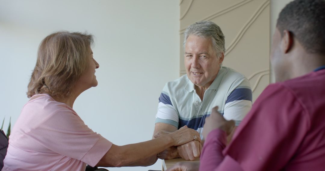 Senior Couple Expressing Affection While Holding Hands