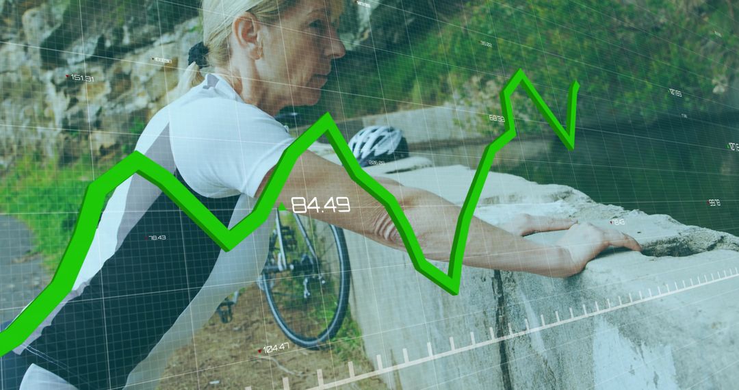 Cyclist Stretching Amid Financial Data Visualization