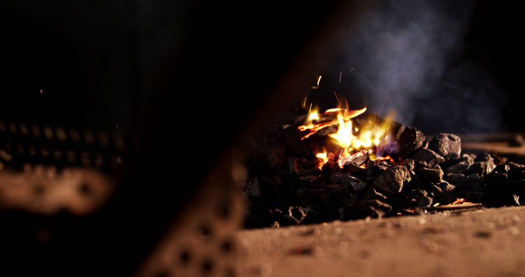 Close-Up of Smoldering Coals Amid Glowing Fire, Blurred Foreground - Free Images, Stock Photos and Pictures on Pikwizard.com