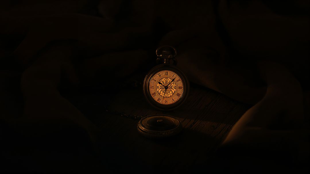 Glowing Antique Pocket Watch with Exposed Gears and Vintage Charm