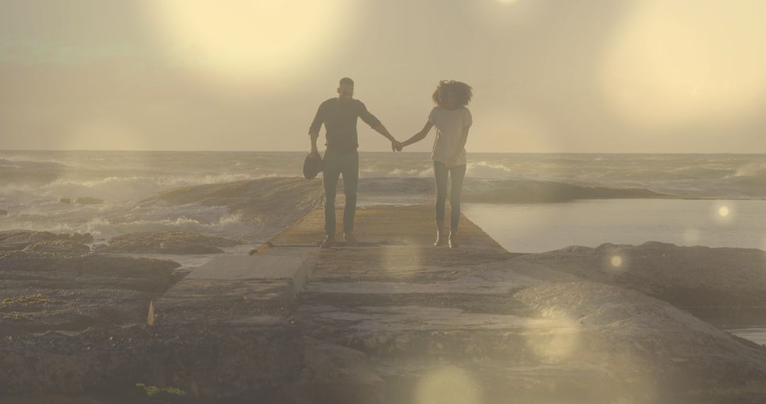 Romantic Couple Holding Hands Along Clifftops