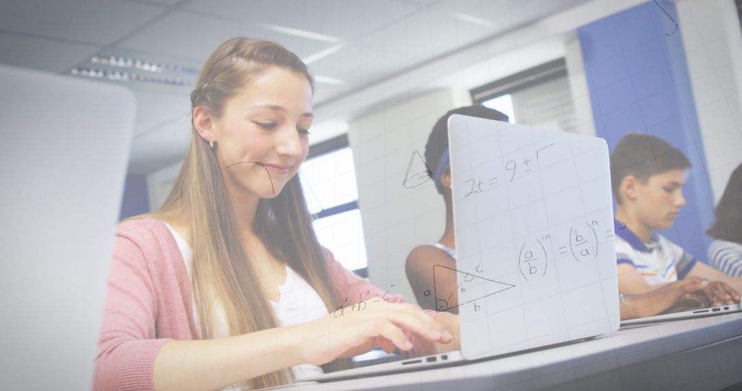 Focused Female Student Using Laptop with Geometric Formulas
