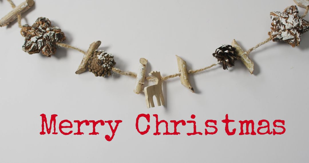 Rustic Merry Christmas Garland with Pinecones and Wood